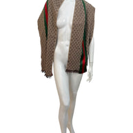 Full length view of Gucci GG monogram scarf with signature green red stripe and fringe trim