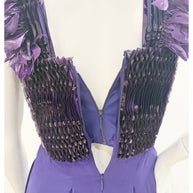 Close-up of back zipper and interior corset construction on Gucci purple embellished gown.