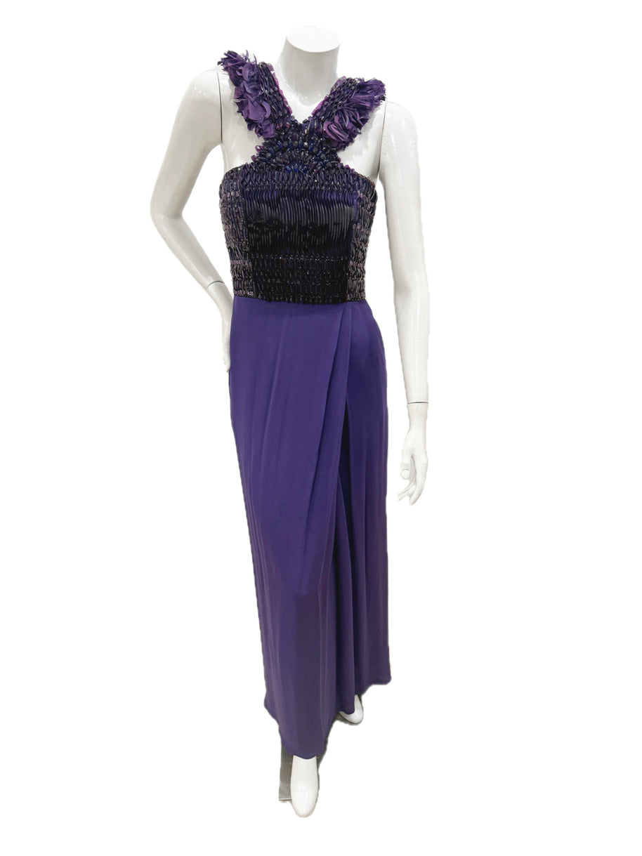 Front view of Gucci purple embellished evening gown with beaded bodice and feather-trim straps on mannequin.