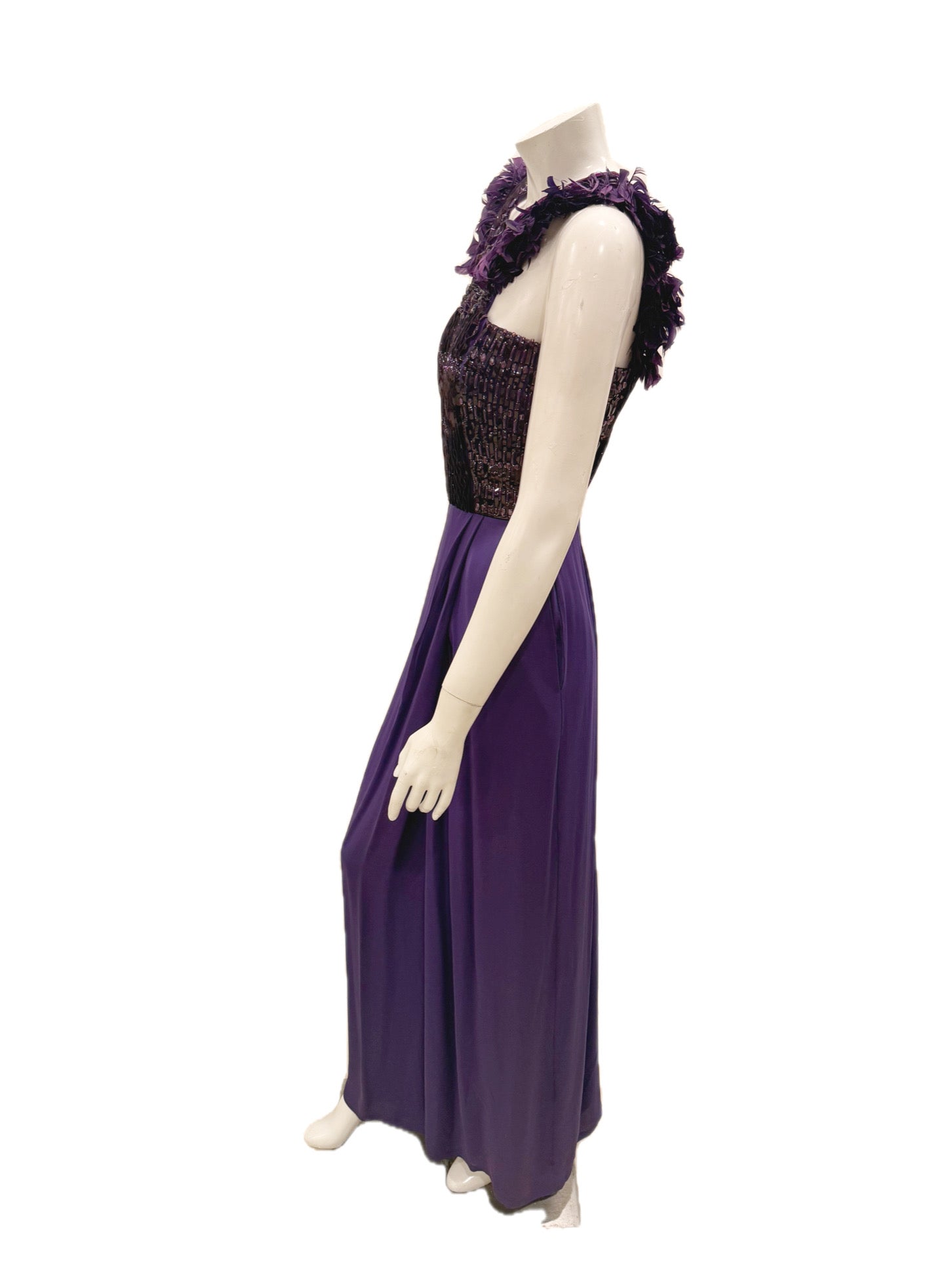 Right side view of Gucci purple embellished evening gown on mannequin.