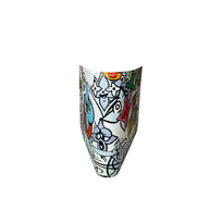 Side angle of Louis Vuitton SS23 Comics Wallet showing wraparound multicolor cartoon print on coated canvas.