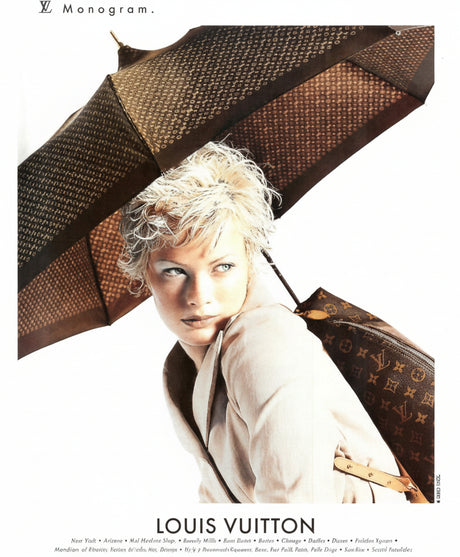 Louis Vuitton archival campaign image representing authenticated pre-owned Louis Vuitton handbags and luxury accessories at Refined Concierge Consignment