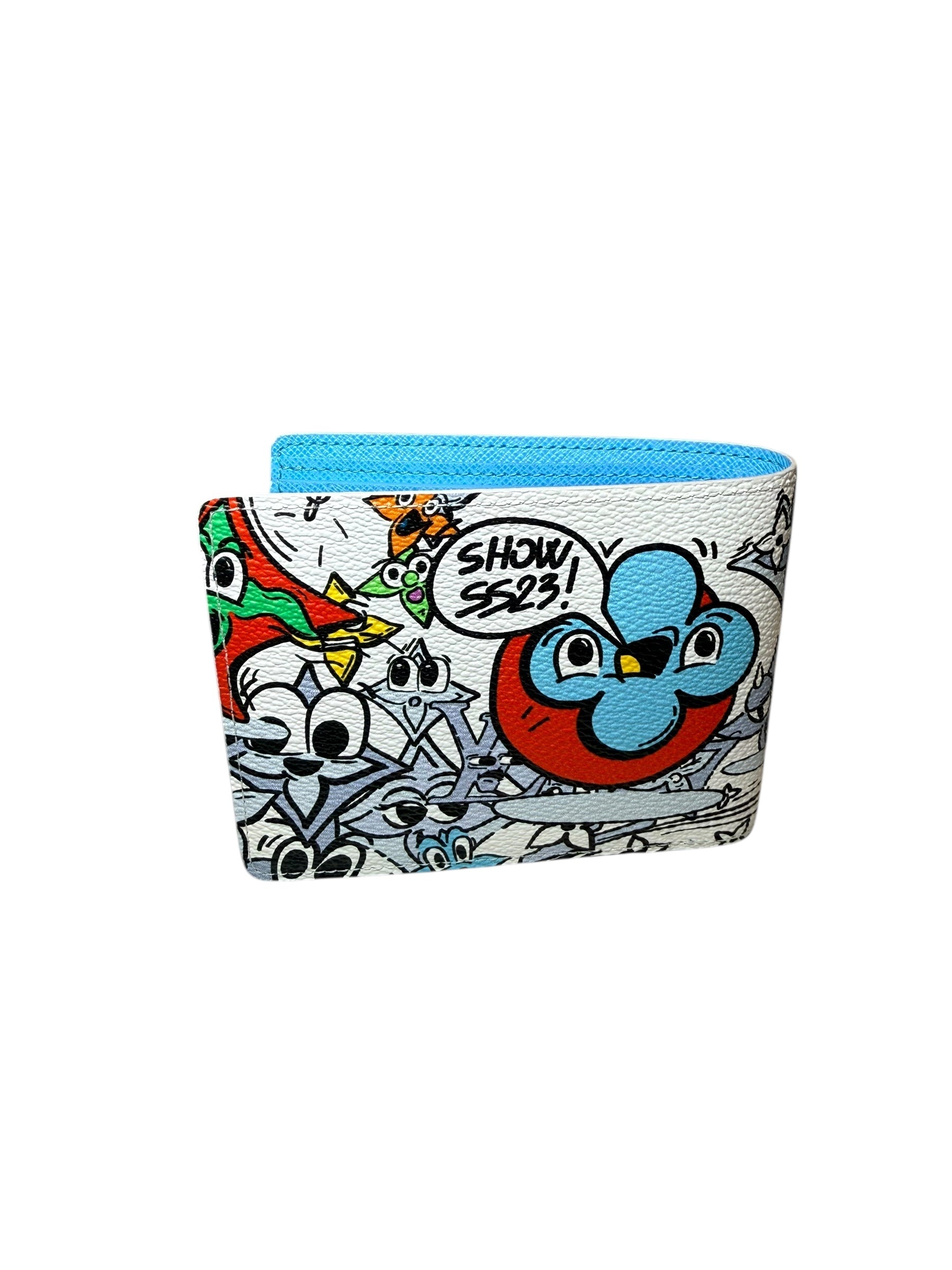 Back side of Louis Vuitton Comics Wallet highlighting multicolor cartoon LV characters and graphic details.
