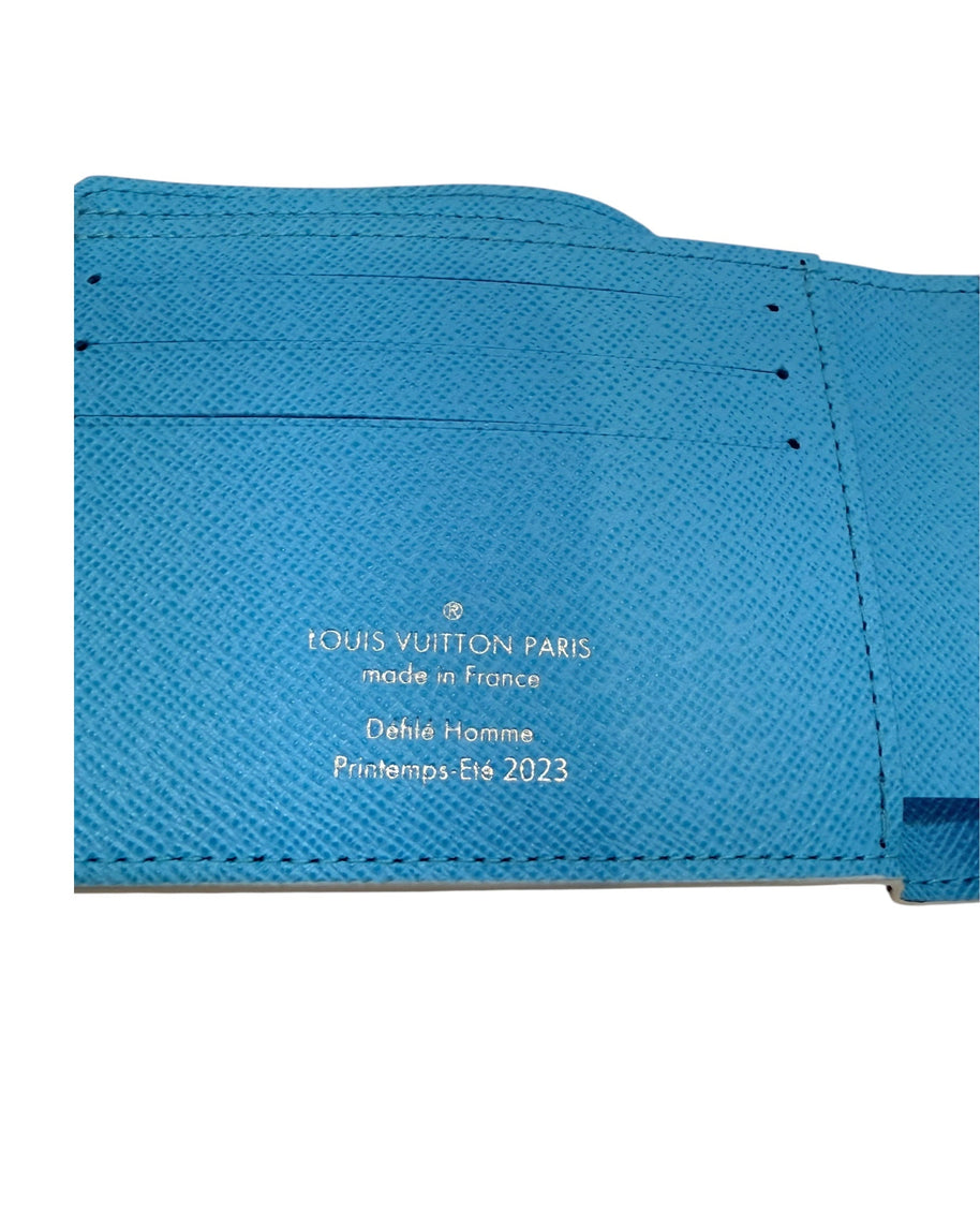 Interior stamp of Louis Vuitton SS23 Comics Wallet showing Made in France and Printemps Été 2023 marking.