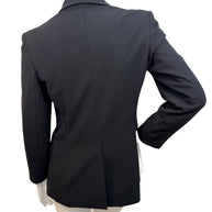 Back view of vintage Moschino Jeans black blazer displaying clean tailoring and structured fit, made in Italy