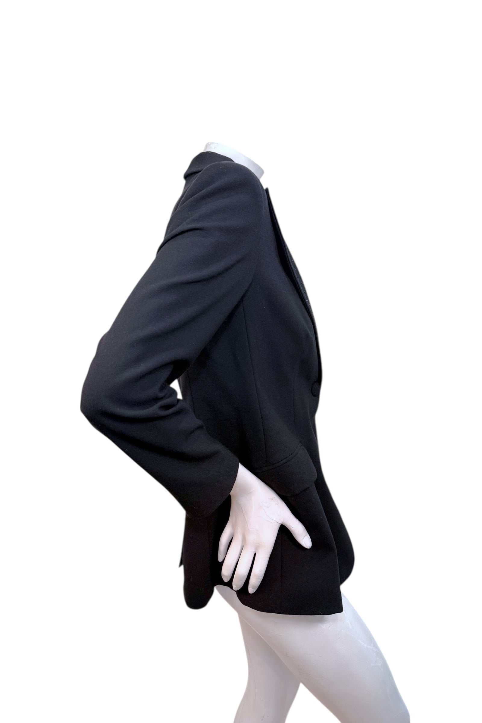 Side back angle of vintage Moschino Jeans black blazer highlighting tailored waist and classic silhouette