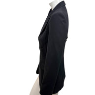 Side profile of vintage Moschino Jeans black tailored blazer showing slim silhouette and long sleeves