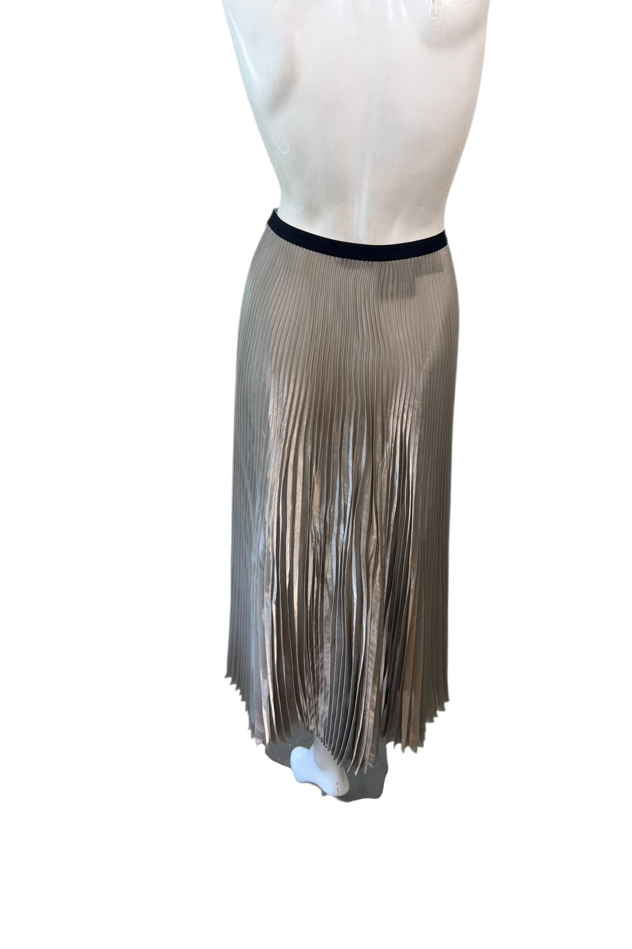 Back view of Prada metallic pleated midi skirt in champagne silver with continuous plissé texture and elastic waistband.