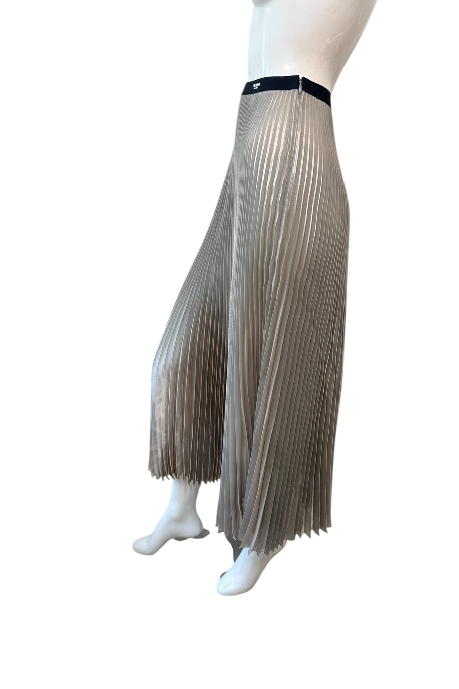 Side angle of Prada metallic pleated midi skirt emphasizing fluid pleats, shimmering fabric, and elegant movement.