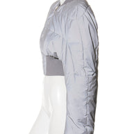 Rick Owens Light gray quilted puffer bomber jacket on a white mannequin against a white background left side view