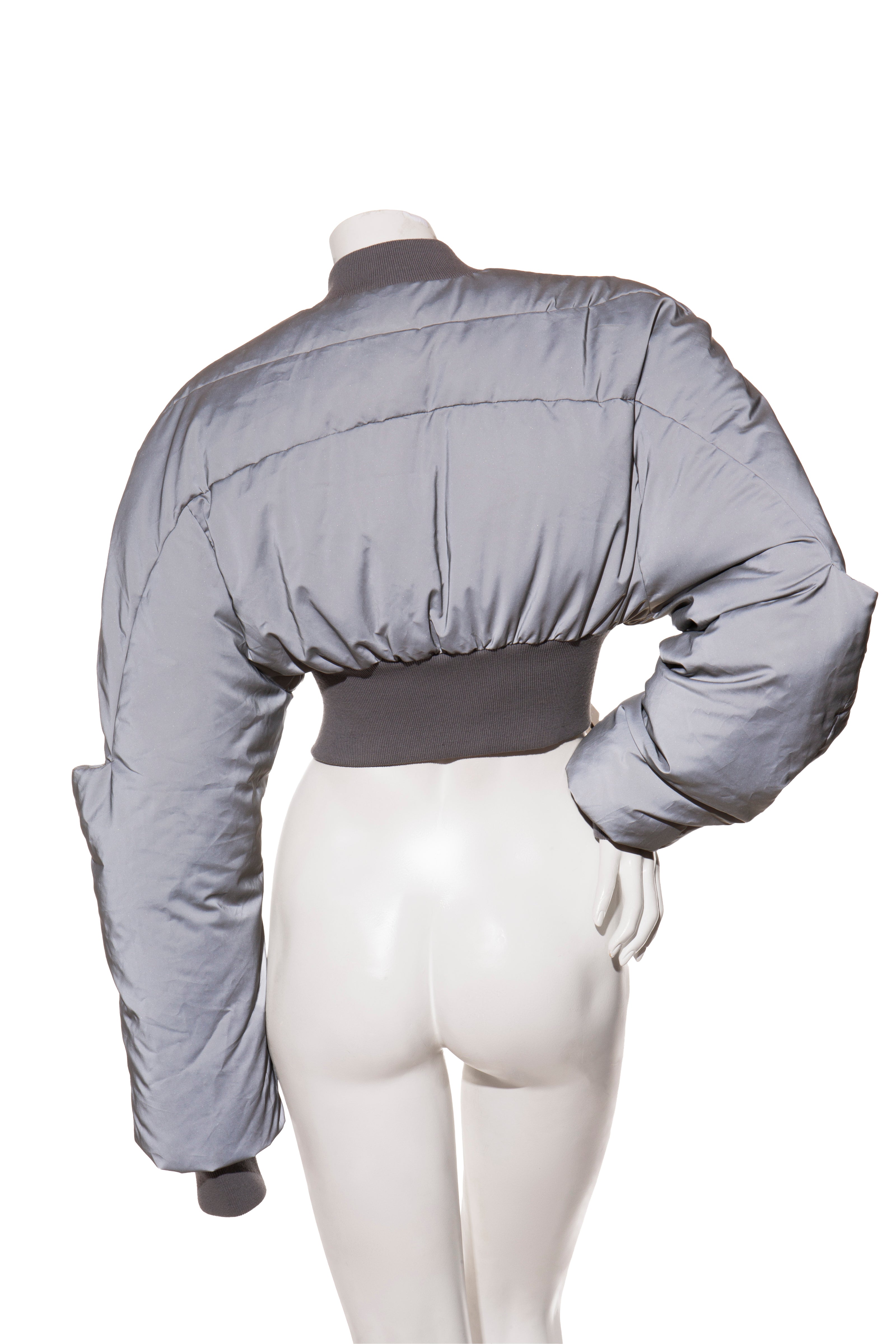 Rick Owens Cropped Gray puffer bomber jacket on a mannequin against a white background back view FW 22 Strobe Collection