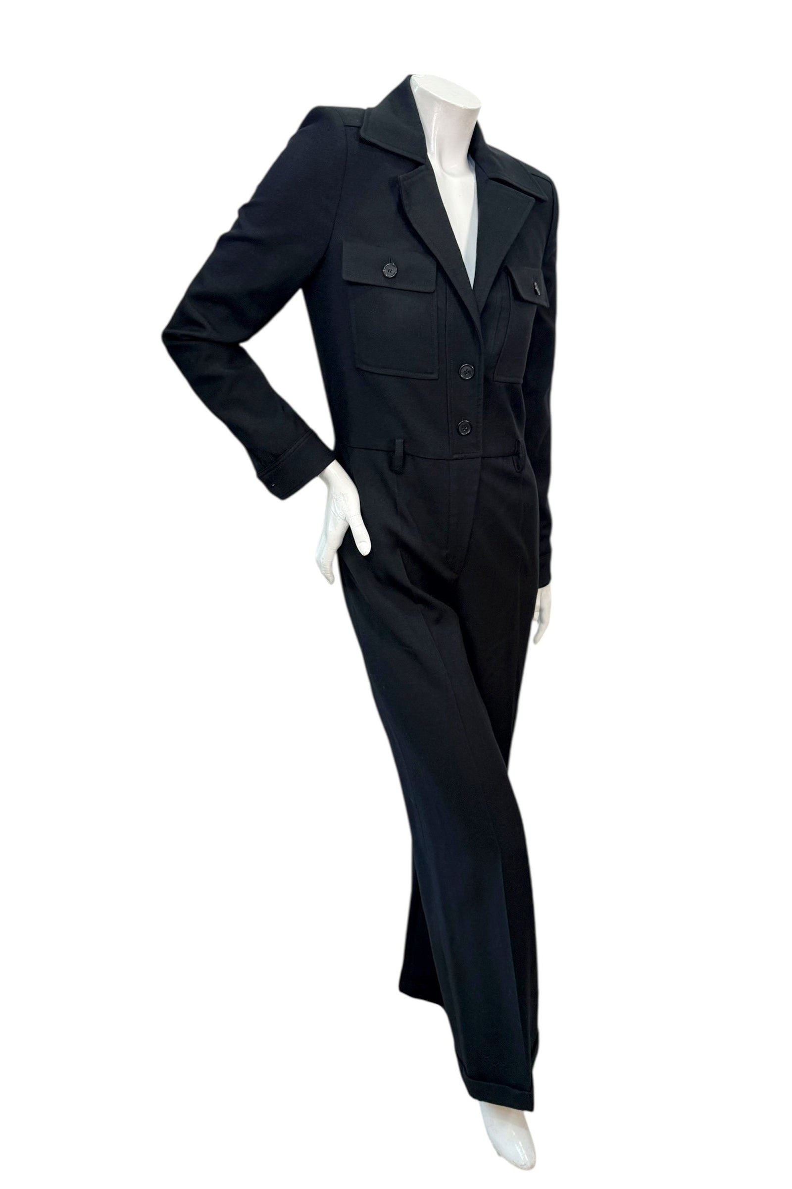 Full-length view of Saint Laurent Paris tailored black wool jumpsuit with structured blazer top and straight-leg trousers.
