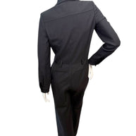 Back view of Saint Laurent Paris tailored black wool jumpsuit with clean seams and refined minimalist finish.