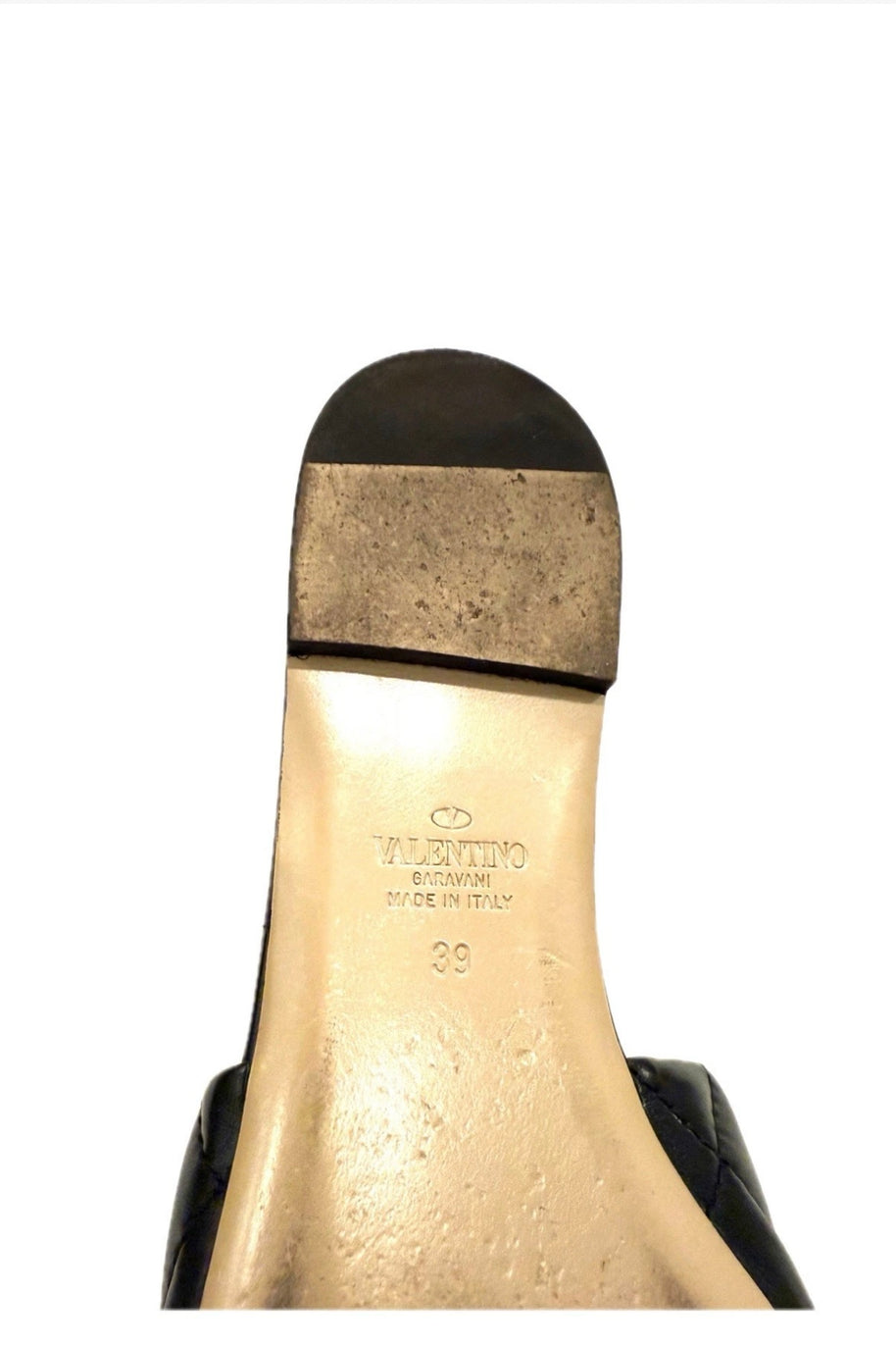 Sole view of Valentino Roman Stud Slides showing wear consistent with light use.