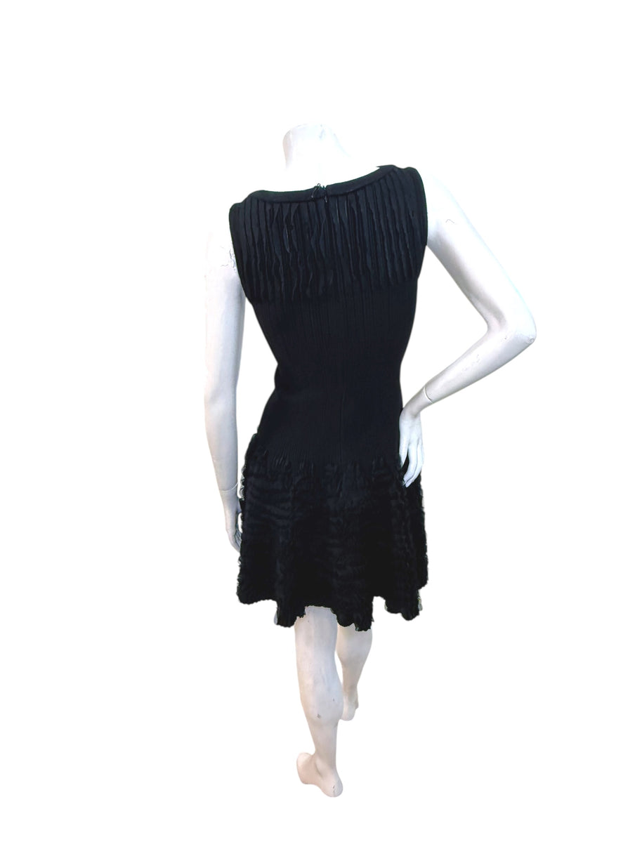 Alaïa black ribbed knit ruffle dress FR38 back three-quarter view