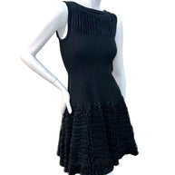 Alaïa black ribbed knit sculptural ruffle dress FR38 close-up side angle view