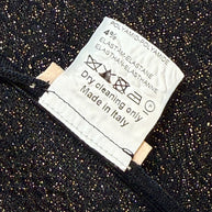 Alaïa black textured knit dress interior composition and care label