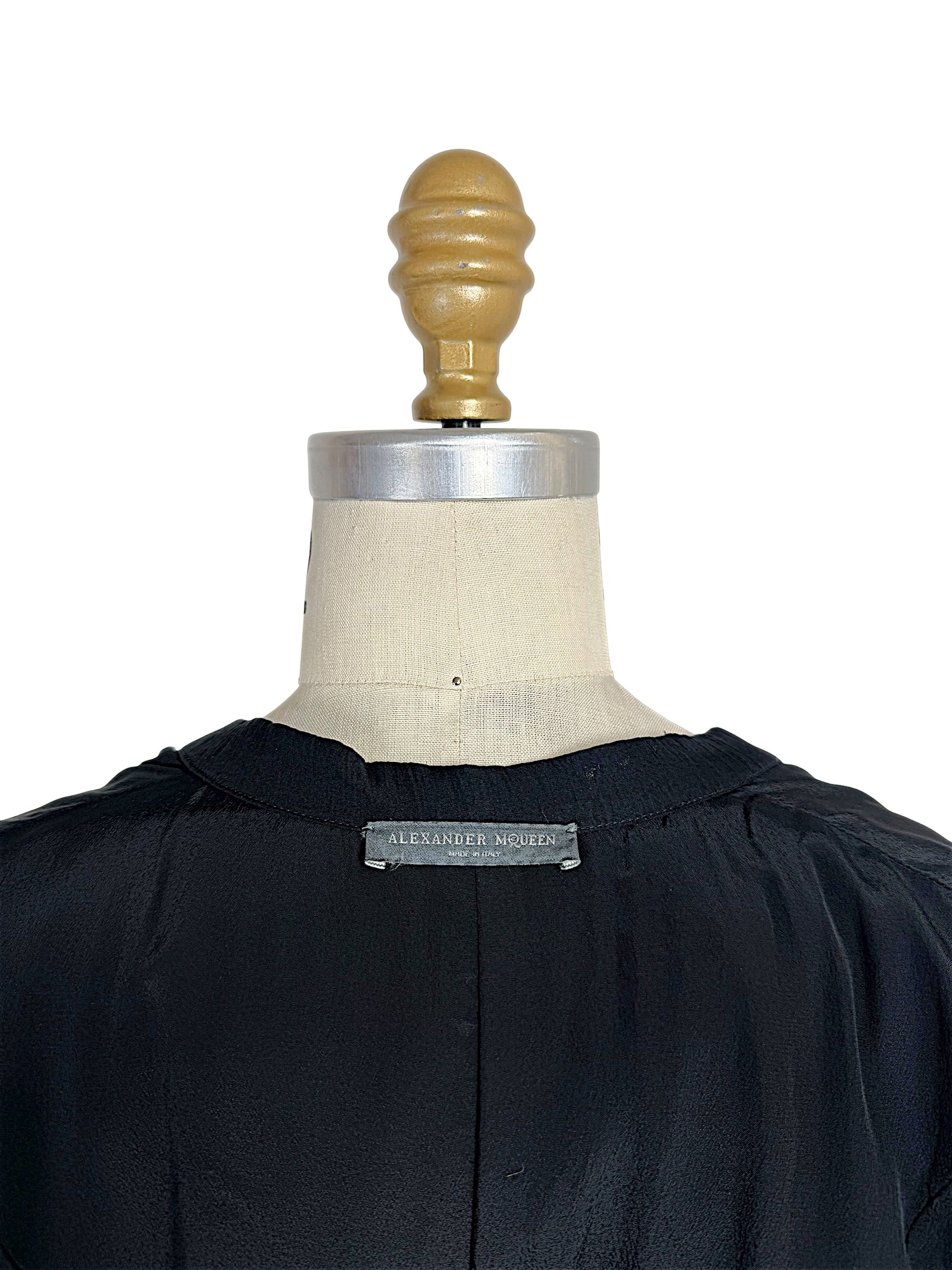 Original Alexander McQueen Made in Italy designer label stitched into the interior neckline of the Pre-Fall 2016 silk chiffon dress.