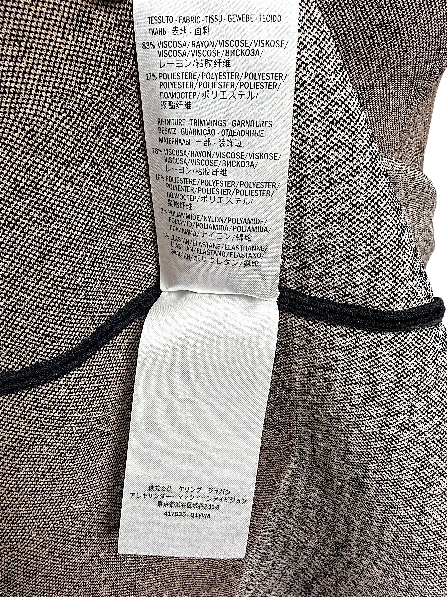 Alexander McQueen fabric composition label showing viscose polyester blend construction