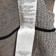 Alexander McQueen fabric composition label showing viscose polyester blend construction