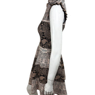 Side profile of Alexander McQueen fit and flare snakeskin knit dress with sculpted silhouette
