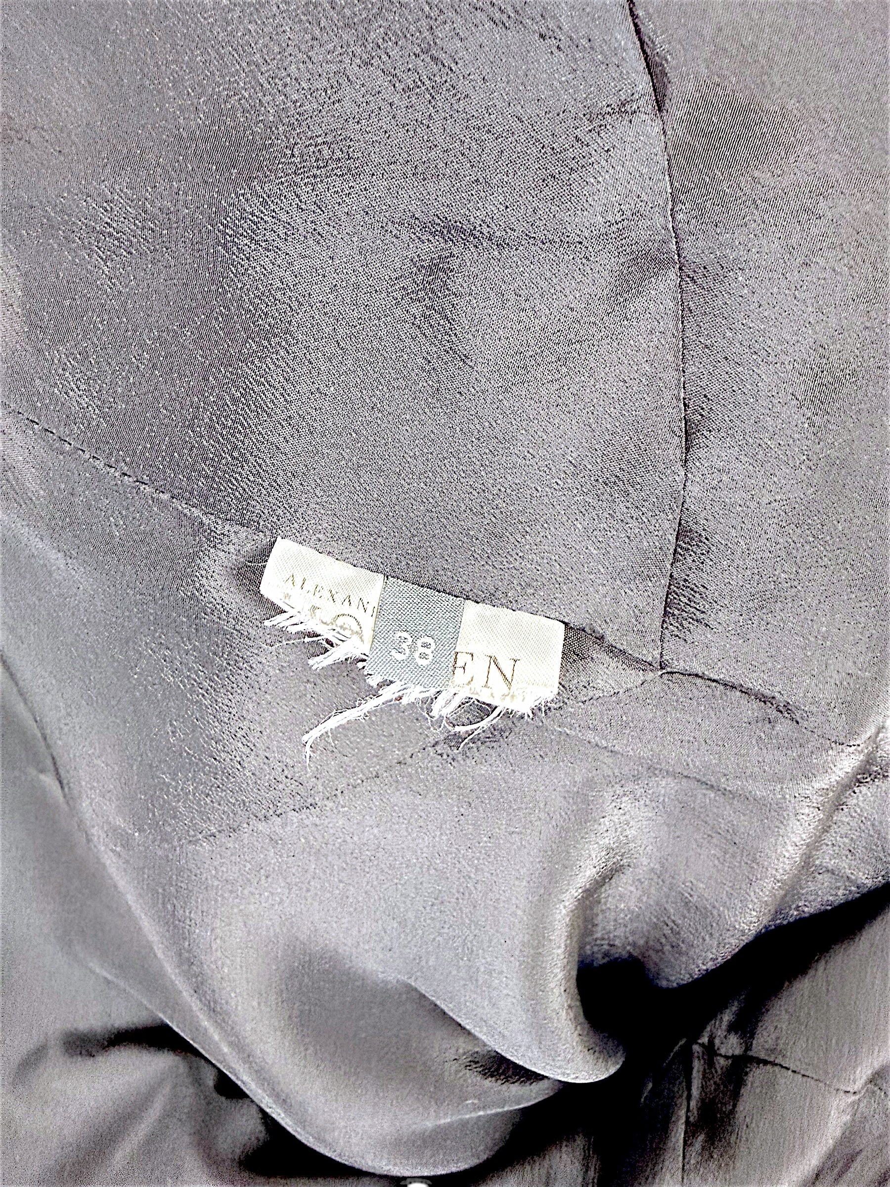 Original Alexander McQueen IT 38 size tag with the composition label removed by the previous owner for comfort.