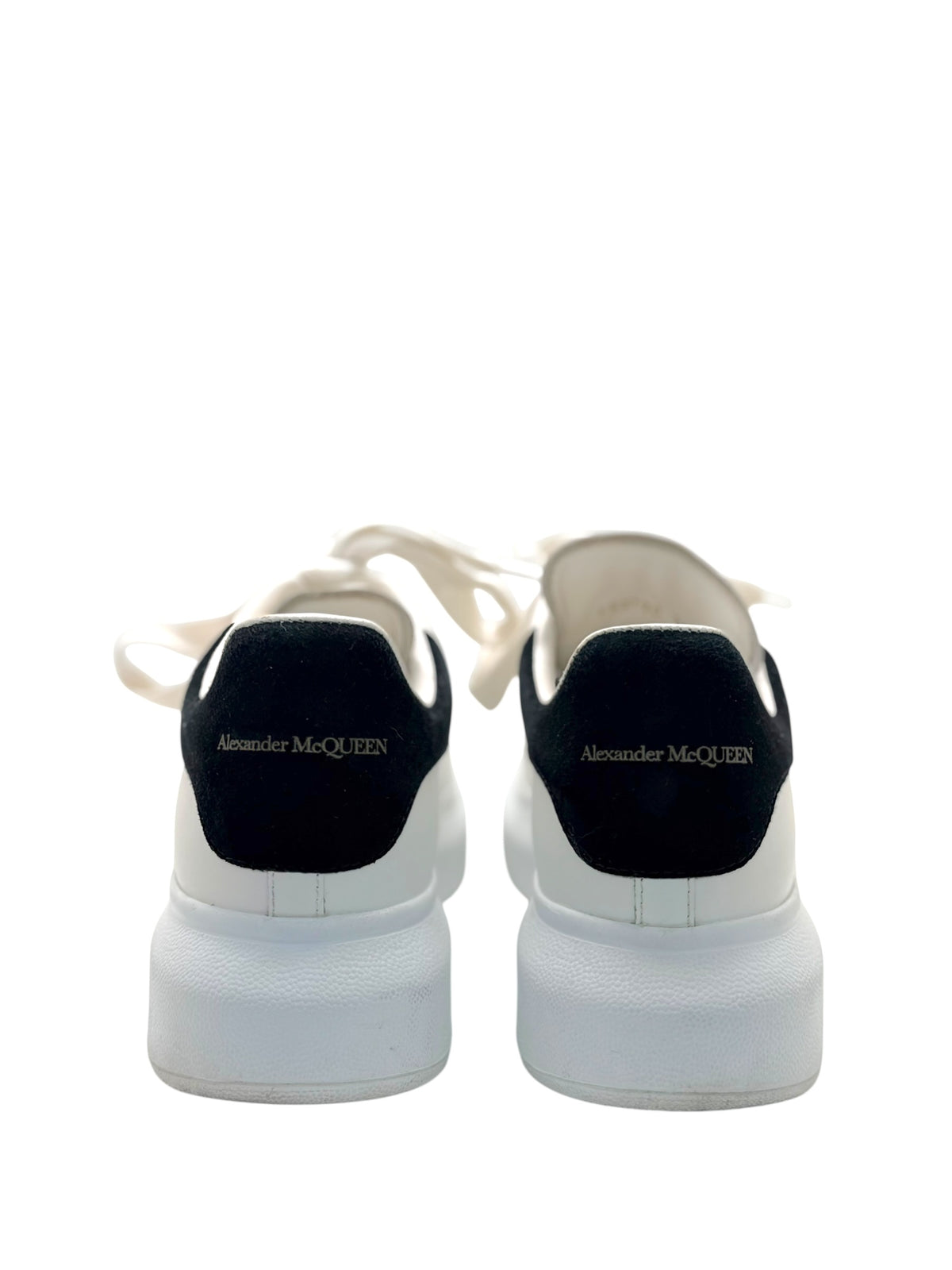 Alexander McQueen oversized sneakers rear view with black leather heel tabs