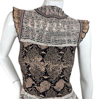 Close up detail of Alexander McQueen snakeskin jacquard knit dress bodice and ruffle trim