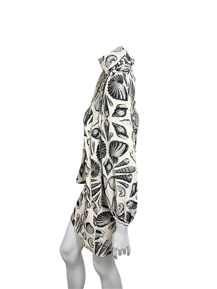 Alexander McQueen Resort 2019 seashell print silk mini dress profile view showing scarf tie and sleeve
