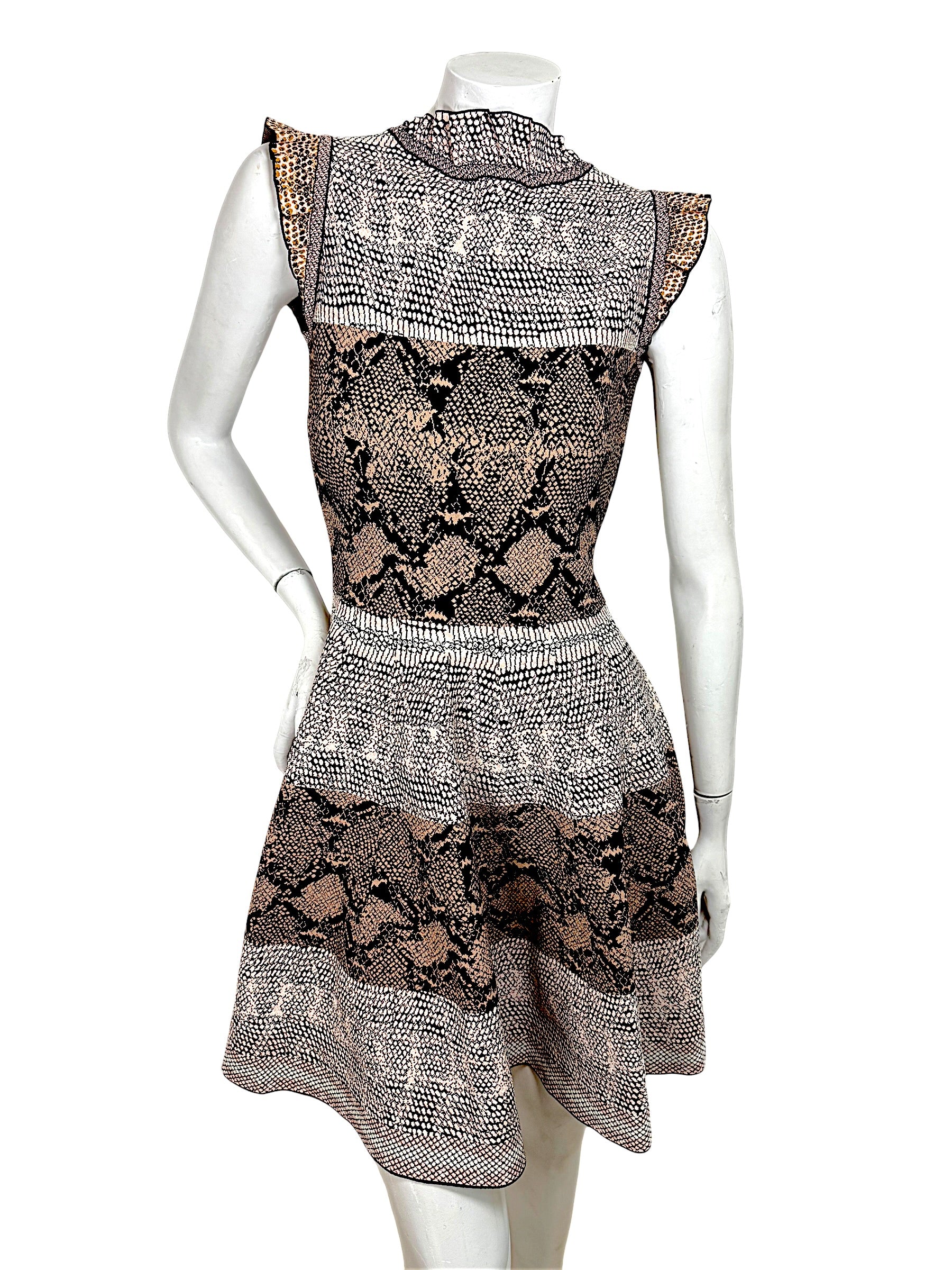 Alexander McQueen snakeskin jacquard knit dress front view with ruffle neckline and fit flare silhouette