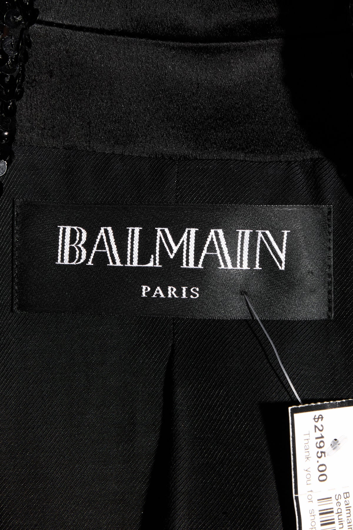 Balmain Paris interior label on black sequin double-breasted blazer