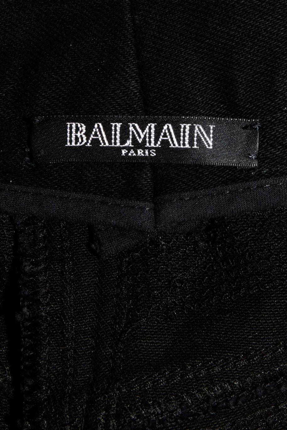Balmain Paris label inside black sequin pants