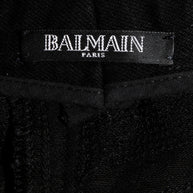 Balmain Paris label inside black sequin pants