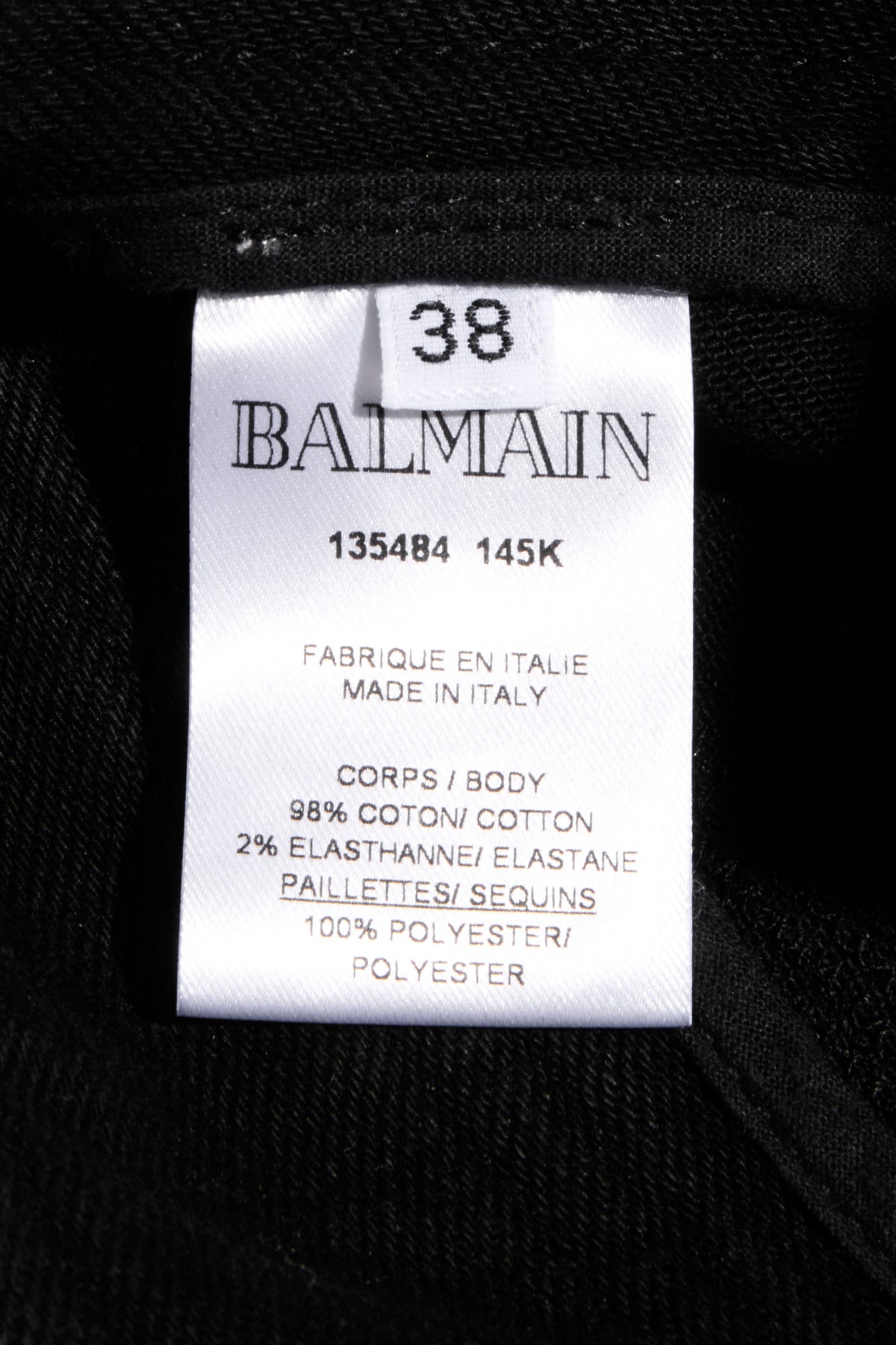 Balmain black sequin pants FR 38 composition label showing cotton and elastane fabric