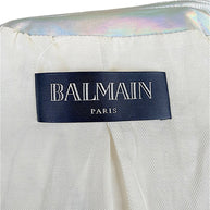 Interior Balmain Paris designer label on Fall Winter 2018 holographic silver quilted runway jacket