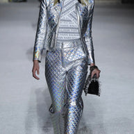 Balmain Fall Winter 2018 Look 8 runway presentation featuring the holographic silver quilted jacket with coordinating trousers
