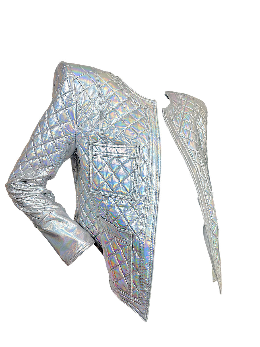 Balmain FW18 Look 8 holographic silver quilted jacket angled front view showing structured shoulder, patch pockets and iridescent finish