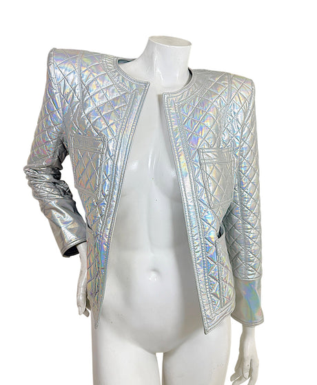 Balmain Fall Winter 2018 Look 8 holographic silver quilted jacket front view with structured shoulders and four patch pockets
