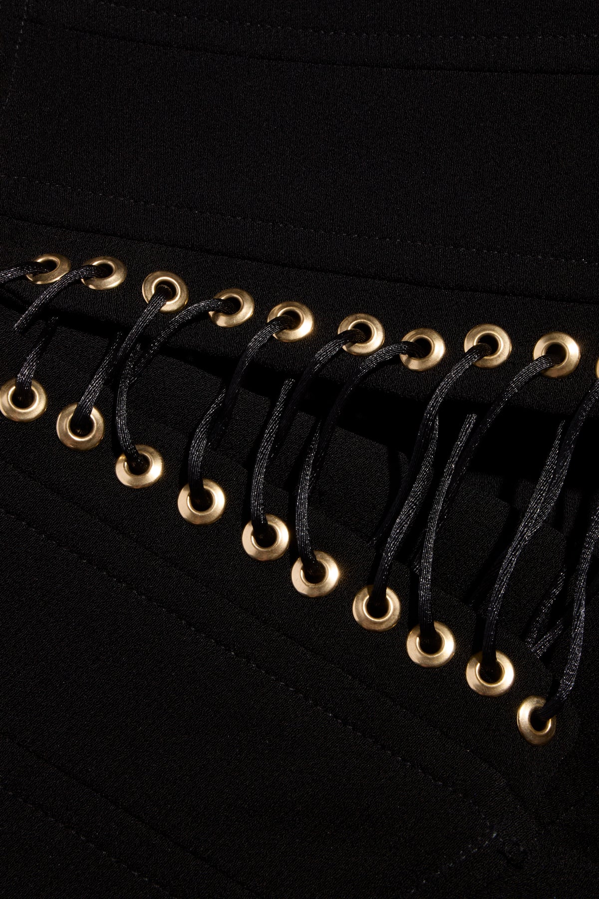 Balmain FW2016 black corset pants gold eyelet and lace-up waistband detail