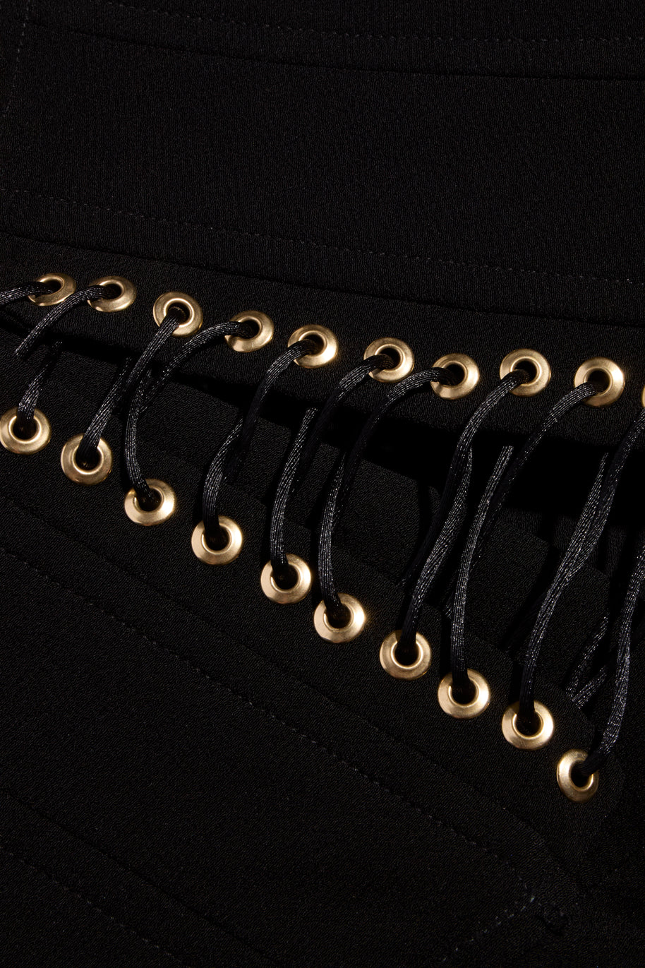Balmain FW2016 black corset pants gold eyelet and lace-up waistband detail