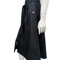 Opposite side view of Celine black belted cotton midi skirt displaying side pocket with gold-tone button and relaxed silhouette.