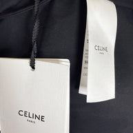 Original Celine Paris retail hangtag and interior designer labels attached to unworn black cotton midi skirt, new with tags.