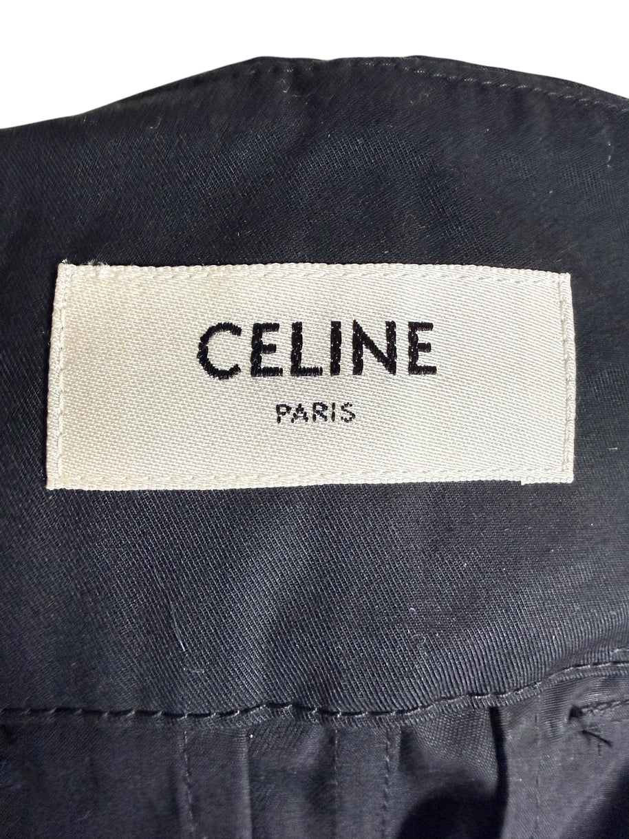 Interior Celine Paris woven designer label on black cotton belted midi skirt, showing original brand identification.