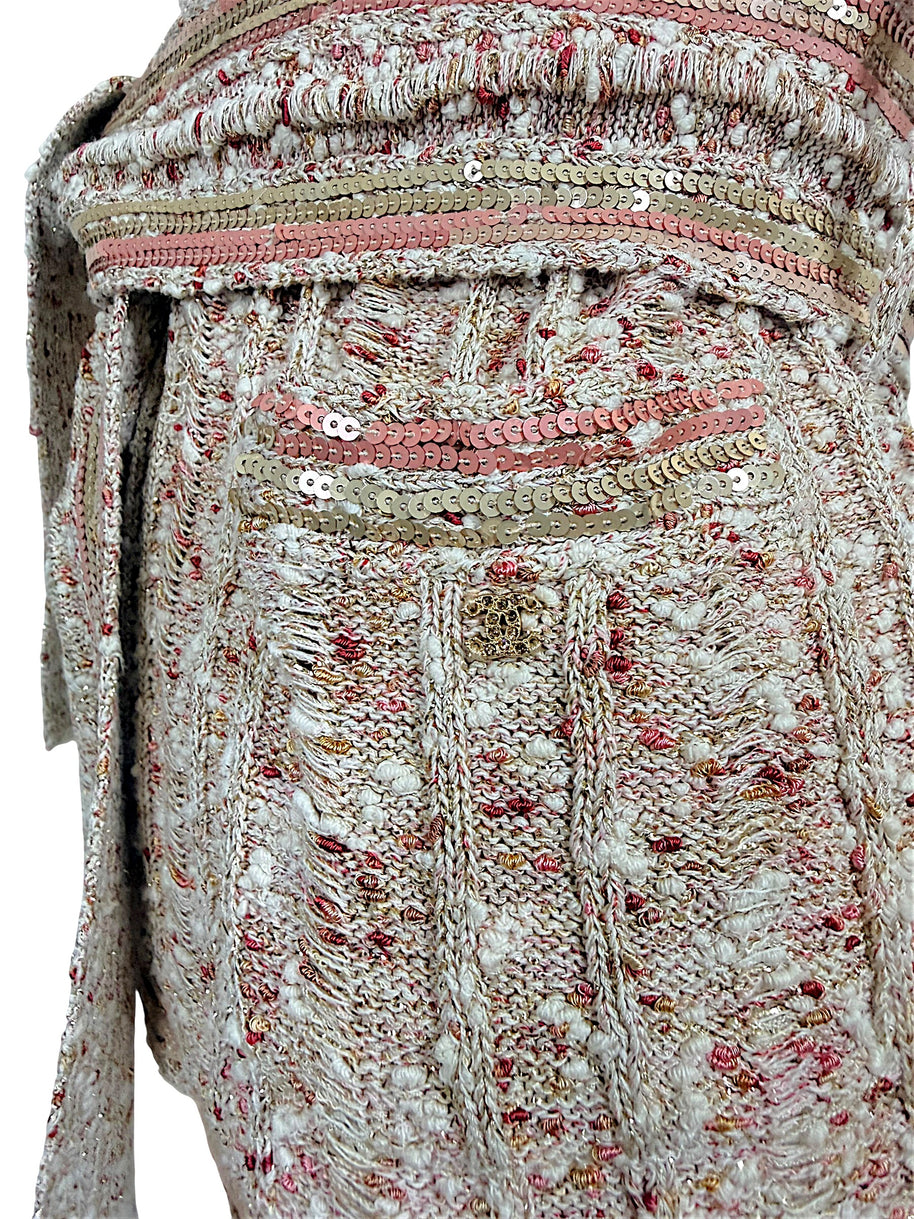 Chanel Spring 2006 knit cardigan close-up showing pink gold sequin trim and gold-tone CC pocket charm