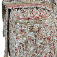 Chanel Spring 2006 knit cardigan close-up showing pink gold sequin trim and gold-tone CC pocket charm