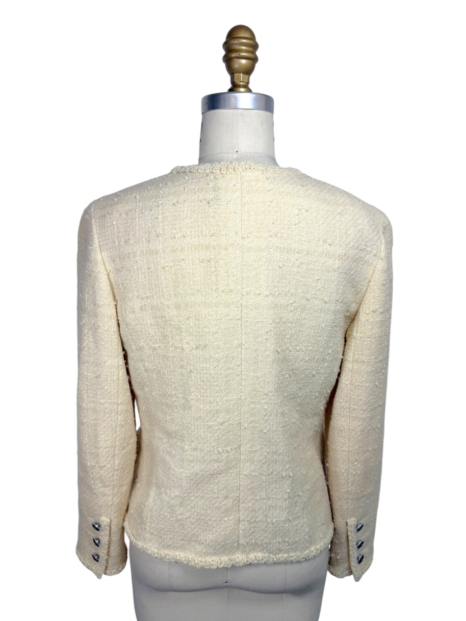 Back view of 1998 Chanel ivory bouclé tweed jacket with tailored seams and fringe trim
