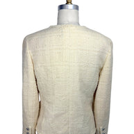 Back view of 1998 Chanel ivory bouclé tweed jacket with tailored seams and fringe trim