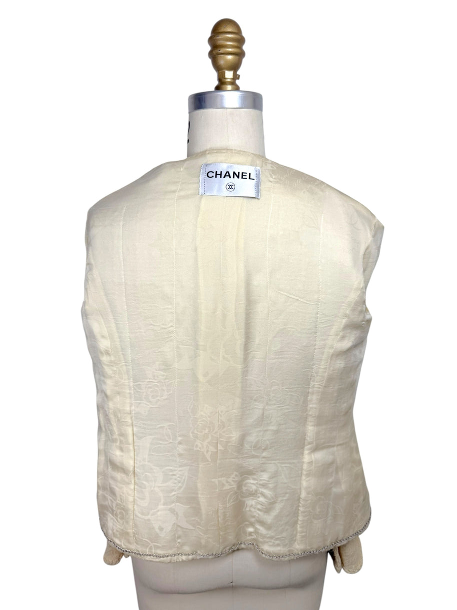 Interior silk camellia jacquard lining of vintage Chanel 1998 ivory bouclé jacket