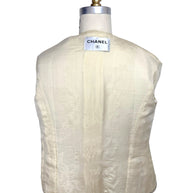 Interior silk camellia jacquard lining of vintage Chanel 1998 ivory bouclé jacket
