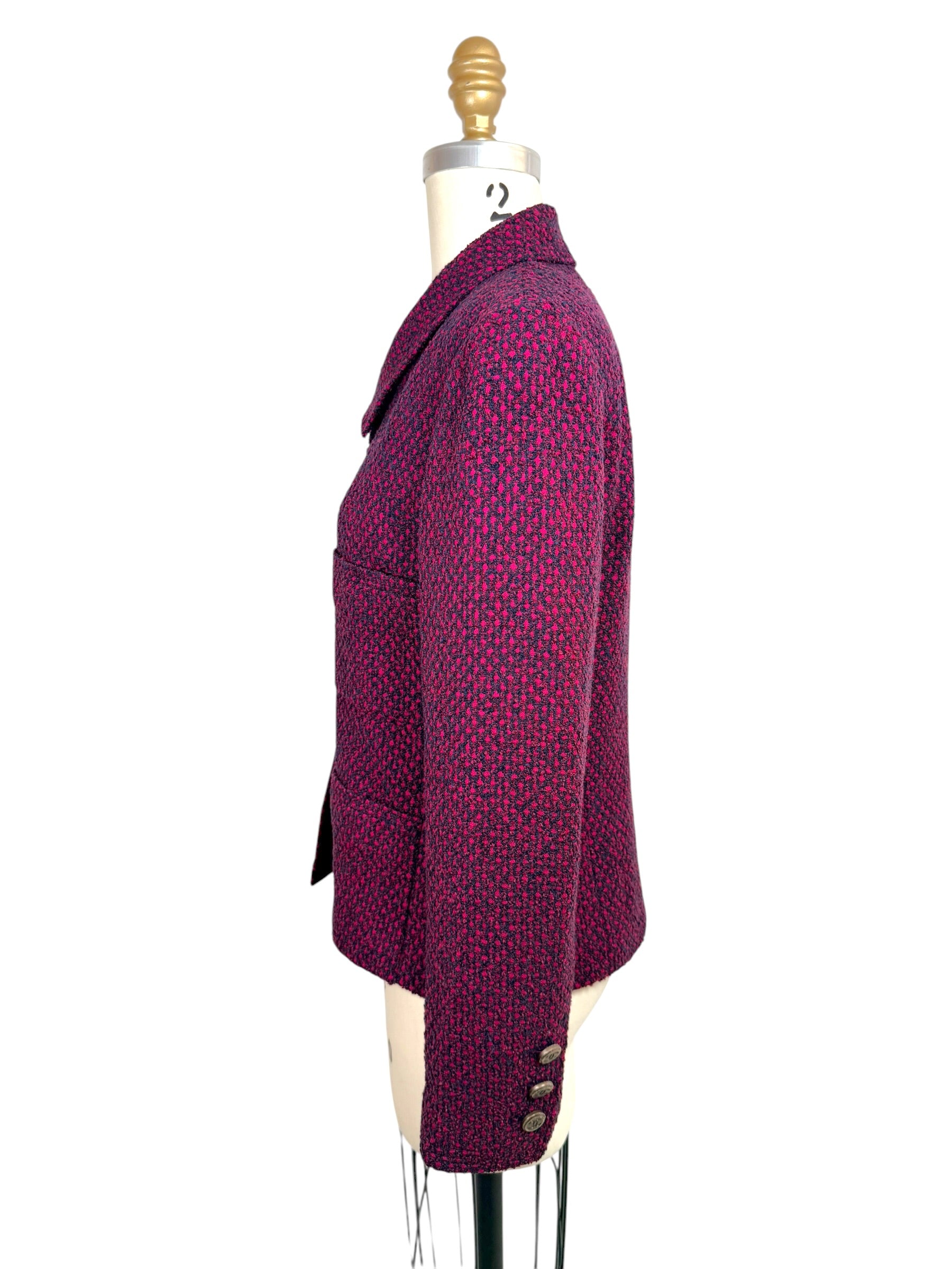 Side back profile of Chanel 1998 tweed jacket highlighting textured weave and tailored construction